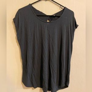 Black/charcoal tee with twist design in the back.